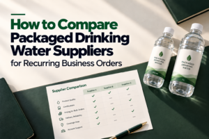 How to compare packaged drinking water suppliers for recurring business orders, featuring labeled 500 ml and 1 L water bottles alongside a supplier comparison checklist.